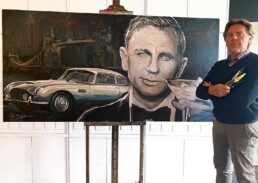 BURNT PAINTING Daniel Craig with Aston Martin DB5 portrait painting by Peter Engels. Look for the differences.
