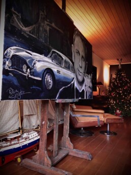 Daniel Craig with Aston Martin DB5 portrait painting by Peter Engels