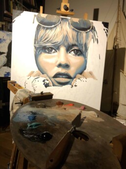 Artwork in progress Brigitte Bardot with woolly gloves portrait painting by Peter Engels