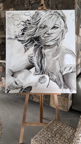 Brigitte Bardot playing guitar in windy Mauritius-Art by Peter Engels